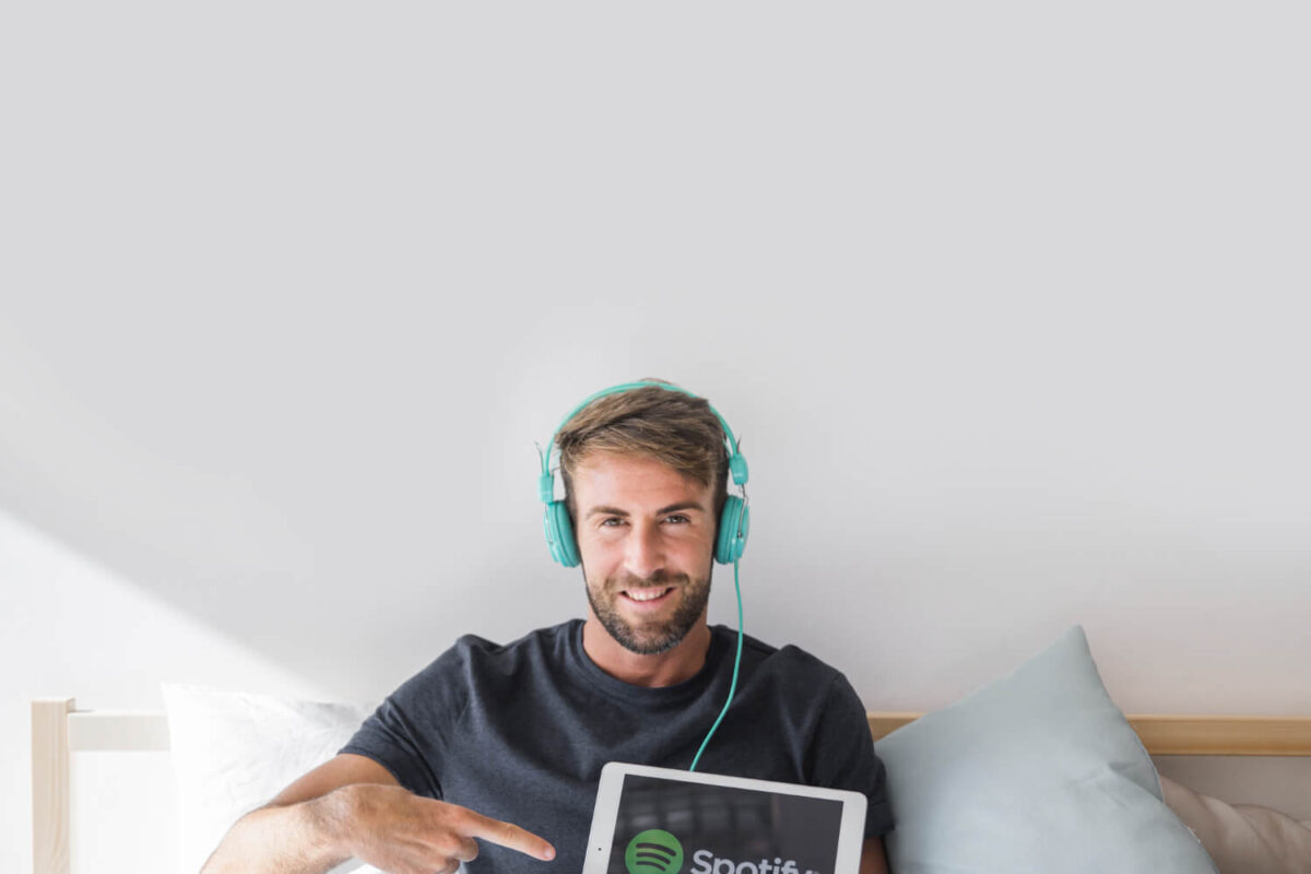 Verified Spotify for Artists profile with a blue checkmark on a phone