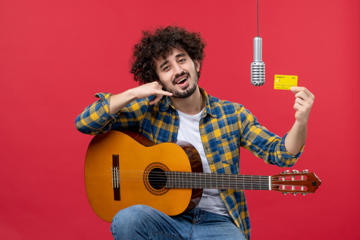 Independent musician promoting a new song on social media from a phone