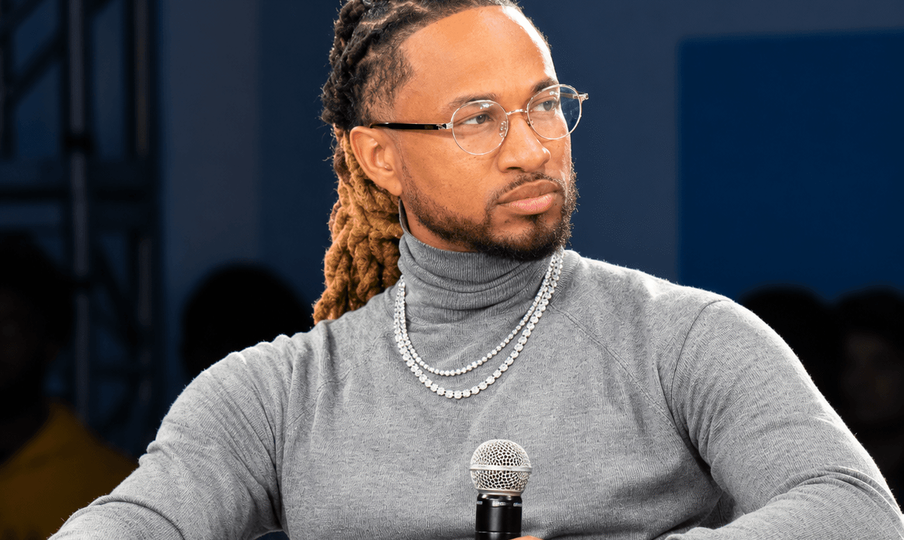 Pretty Ricky performing as a trio after Slick'Em's absence from the group" — swap to "Slick'Em Hound (Corey Mathis) of Pretty Ricky